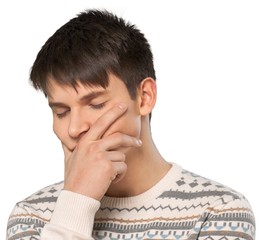 Young man looking pensive