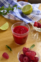 Raspberry smoothies with lime and mint, vertical