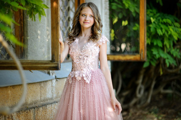 Obraz na płótnie Canvas Beautiful girl in amazing dress outdoor. Wedding dress