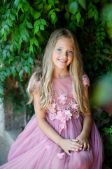 Beautiful girl in amazing dress outdoor. Wedding dress