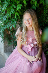 Beautiful girl in amazing dress outdoor. Wedding dress