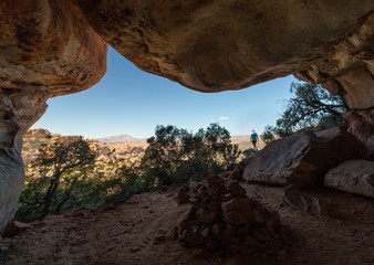 Hiker in desert cave