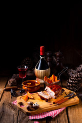 spicy roasted meat with mushroom sauce in the oven