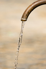 "Big Nose" fountain, a traditional free water public fountain in Rome, Italy