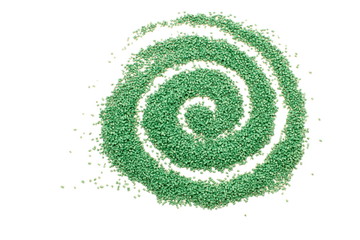 Spiral of granules in green colored polymers