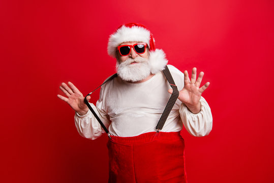 Portrait of cheerful positive dreamy funky Santa congratulations