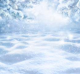 Winter Christmas scenic background with copy space. Snow landscape with spruce branches covered...