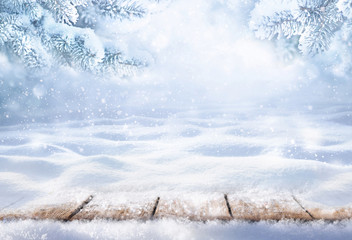 Winter christmas scenic background with copy space. Wooden flooring was strewn with snow in forest...