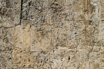 Naklejka premium Old stone background. Texture of ancient masonry