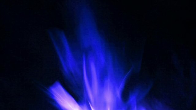 Abstract blue fire on black background.
