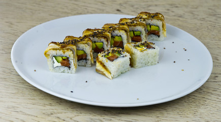 sushi roll with salmon rice cucamber