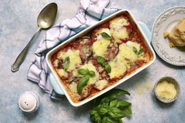 Italian eggplant dish melanzane alla parmigiana.Top view with copy space.