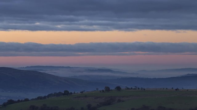 Sunrise Clouds over Scenic Countryside Hills in UK