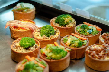 Variety of delicious quiche in France. Quiche is a french speciality