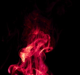 Red smoke on black background