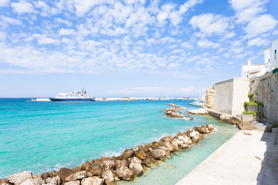 Otranto, Apulia - Sunbathing at the quay of Otranto in Italy