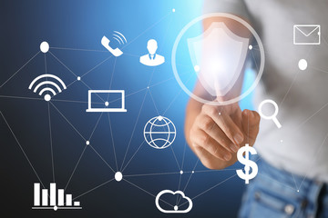 Young woman using virtual screen on color background, closeup