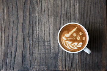 Top view latte art coffee cup.