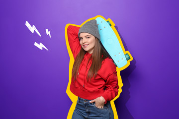 Attractive hipster girl with skateboard on color background © Pixel-Shot