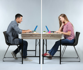 Young couple having online date on light background