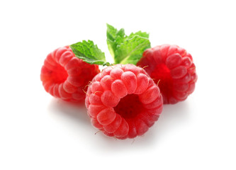 Fototapeta na wymiar Delicious fresh ripe raspberries on white background