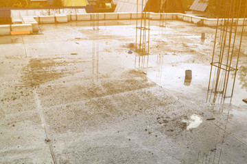 view of the hardened concrete slab base between floors. Construction of a country house made of foam blocks