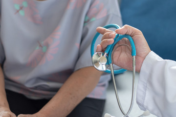 Doctor and patient healthcare concept. Gynecologist physician consulting and examining woman...