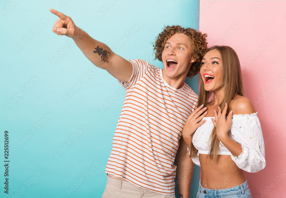 Wall mural Portrait of a happy young couple