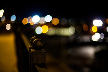 Blur of lights on banister at night