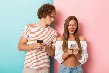 Portrait of a happy young couple standing