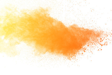 Abstract yellow powder explosion white on  background. Yellow dust particle splashing.