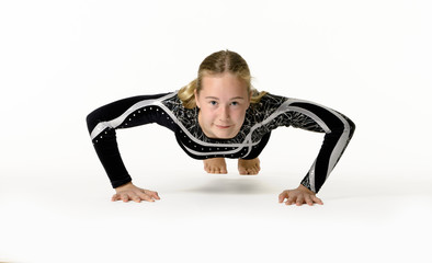 Young teen girl gymnastic on white background
