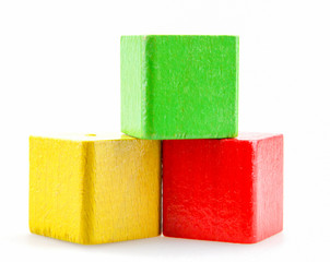 Wooden building blocks isolated on white background.