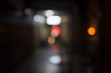 Abstract city night defocused light, blur bokeh, colorful & dark background. Pattern, urban, artistic & backdrop.