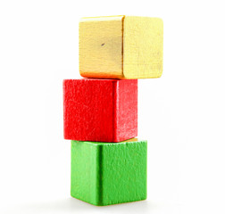 Wooden building blocks isolated on white background.