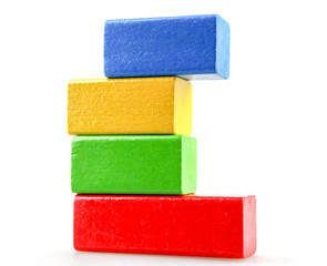 Wooden building blocks isolated on white background.