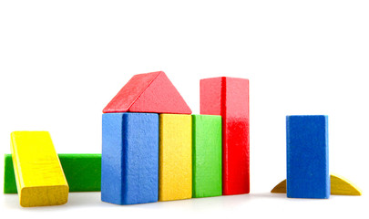 Wooden building blocks isolated on white background.