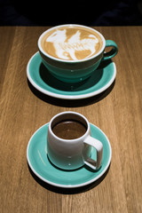 cup of coffee on wooden table