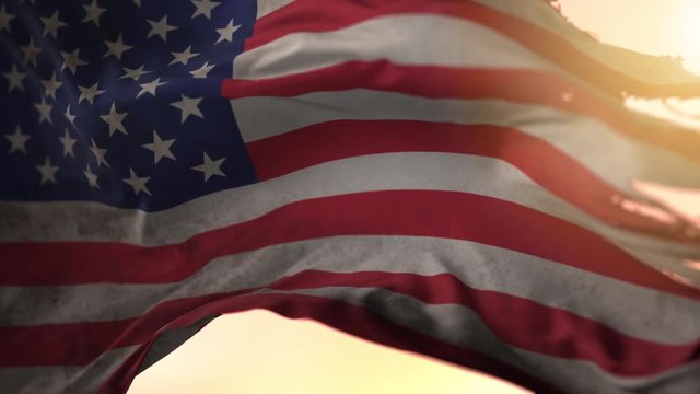 Animation of torned and dirty US war flag blowing in the wind in slow motion, loopable American symbol against sunset
