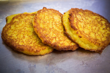 potato pancakes in a frying pan