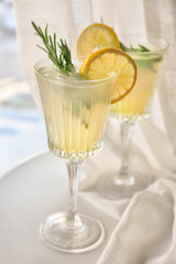 Glasses with delicious summer cocktail on windowsill