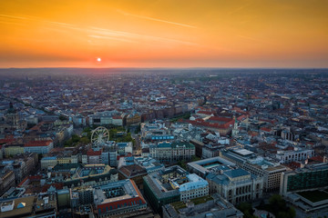 Budapest, Hungary - Aerial skyline view of the centre of Budapest, with St. Stephen's Basilica, Deak Square with ferris wheel at sunrise