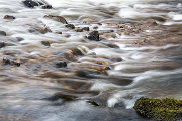 water flowing over rocks