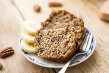 Slice of homemade banana bread on a white plate