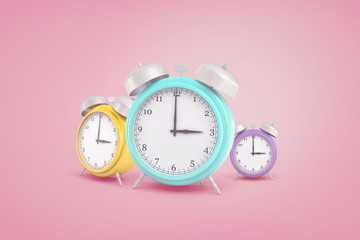 3d rendering of three retro pastel colored alarm clocks standing near each other on a pink background.
