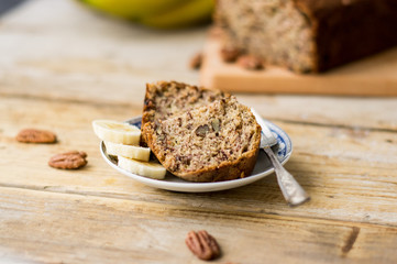 Slice of homemade banana bread on a white plate