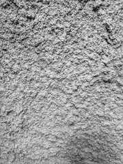 Gray plaster coat on the wall as a background