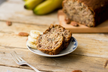 Slice of homemade banana bread on a white plate