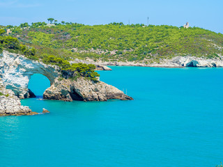 Apulia, Italy: View of the Arco di San Felice, caves and beach, south of Vieste