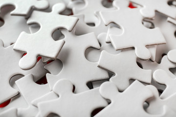 Many pieces of jigsaw puzzle, closeup